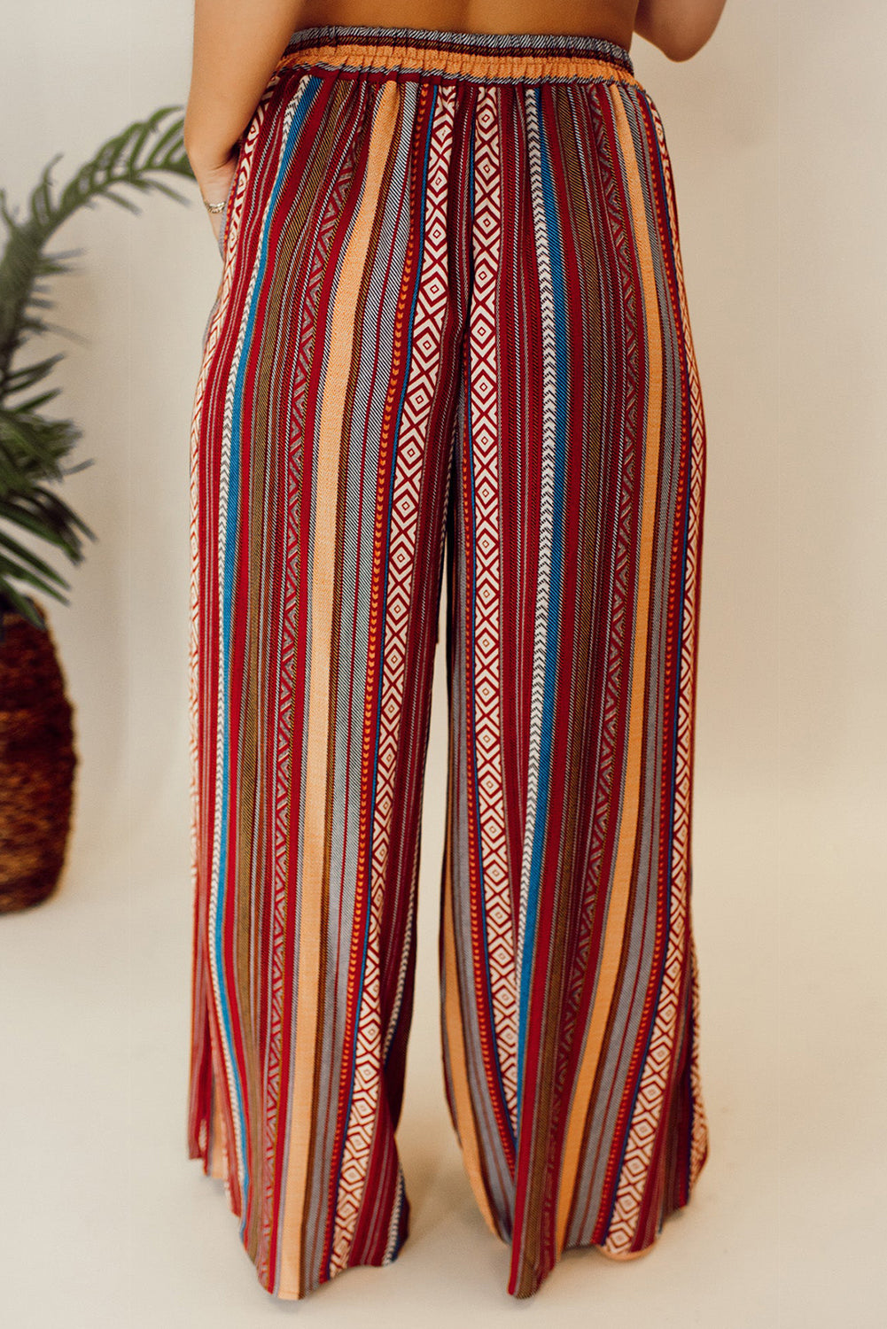 Vibrant red bohemian wide leg pants with ethnic stripes and tie waist