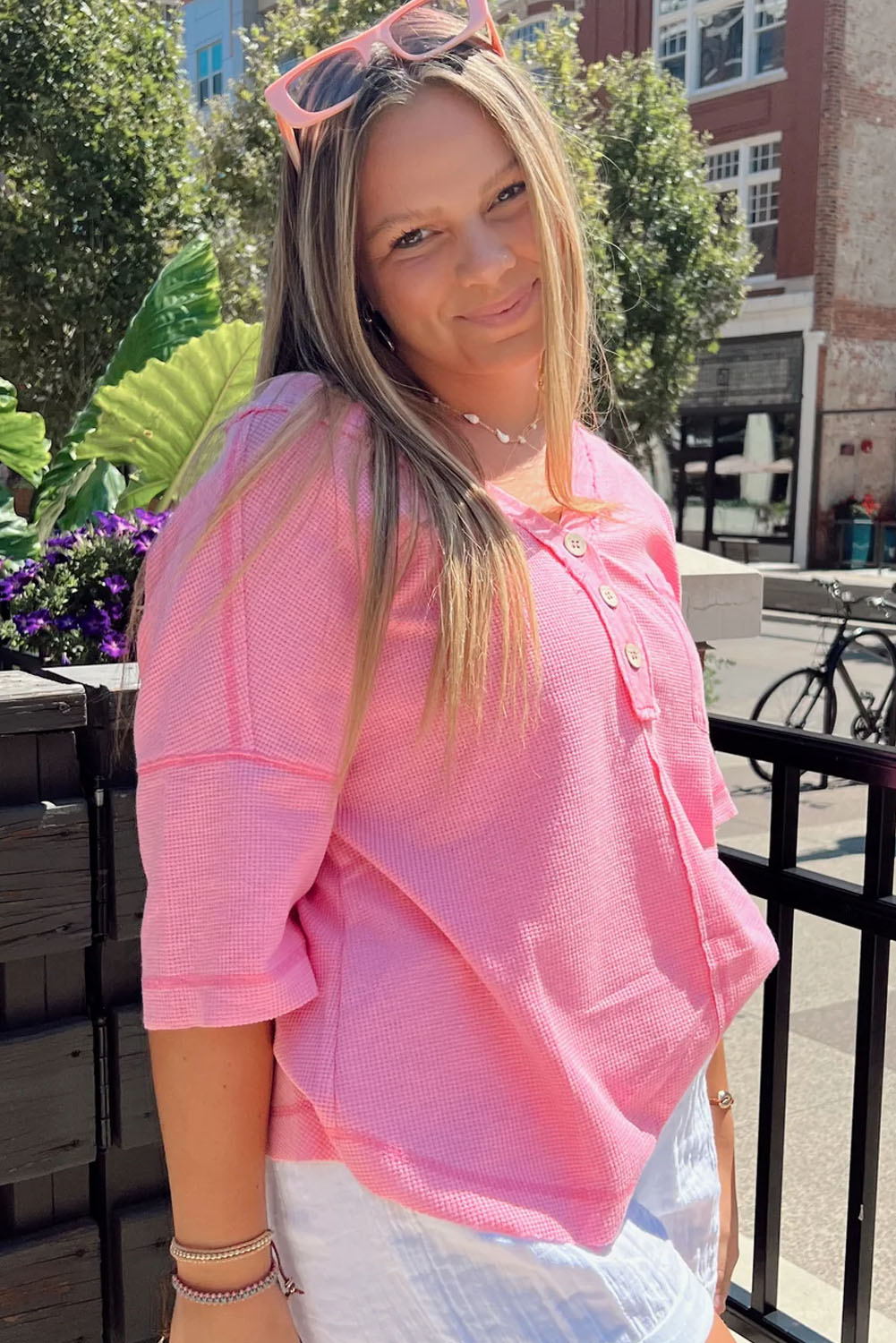 Chic pink plus size waffle knit henley with exposed seams