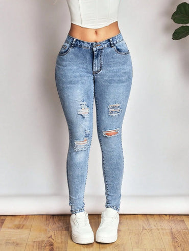 Bow Back Distressed Skinny Jeans