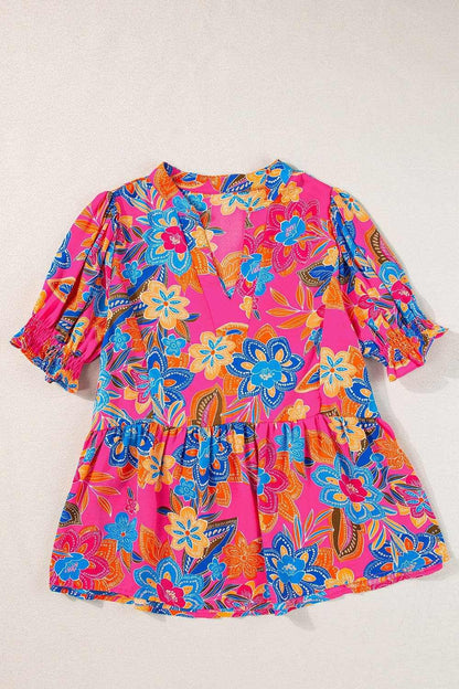 Peplum Printed Notched Short Sleeve Blouse.