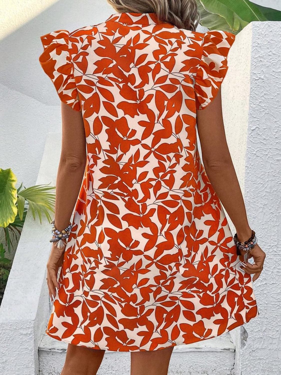 Printed Notched Cap Sleeve Mini Dress.