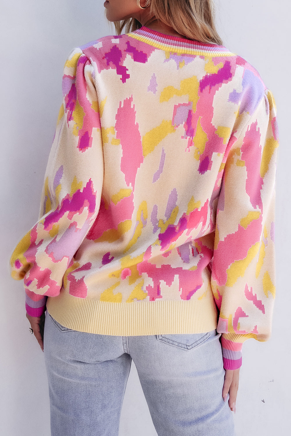 Khaki colorblock balloon sleeve sweater with vibrant abstract print