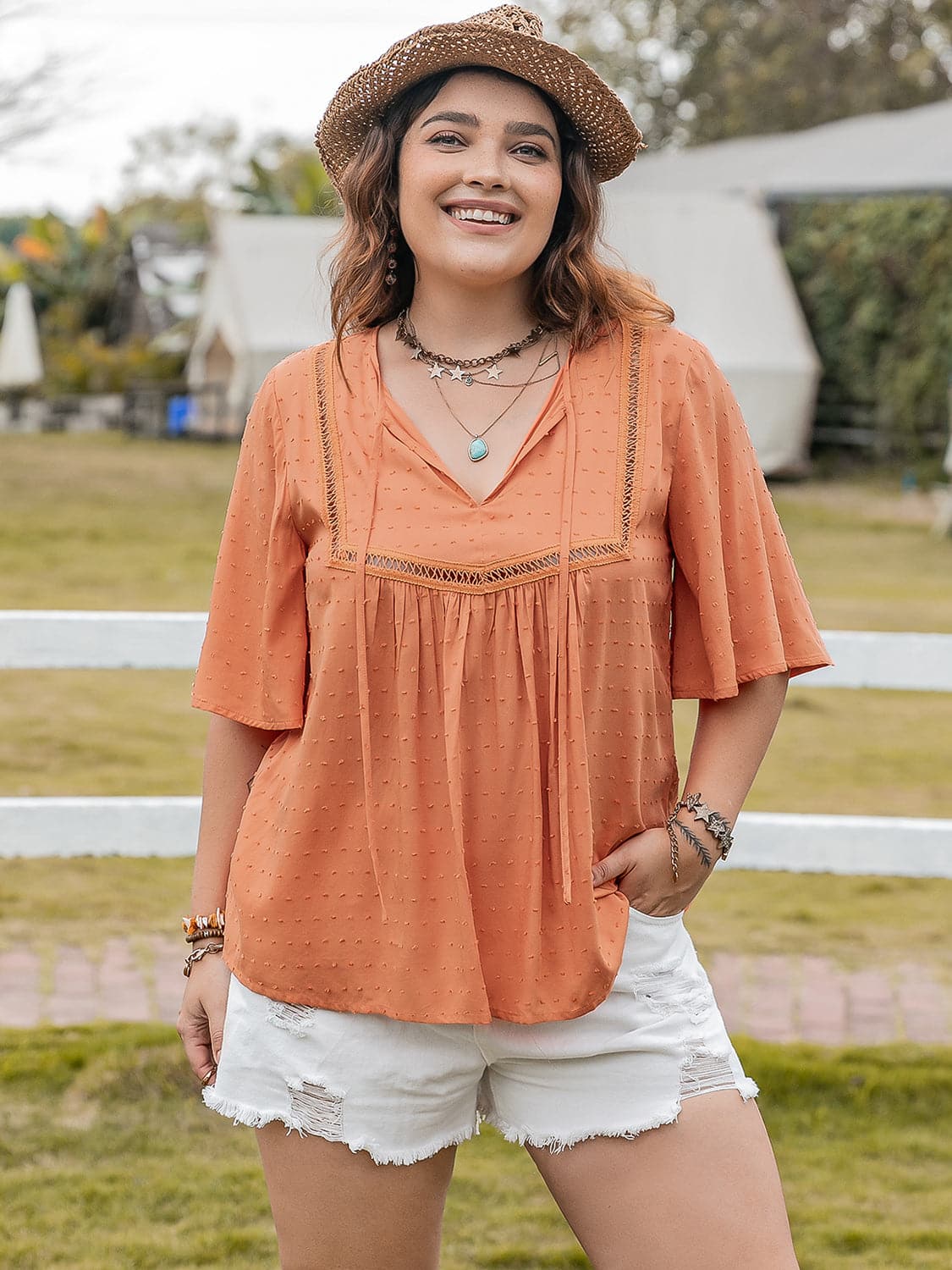 Plus Size Ruched Tie Neck Half Sleeve Blouse.