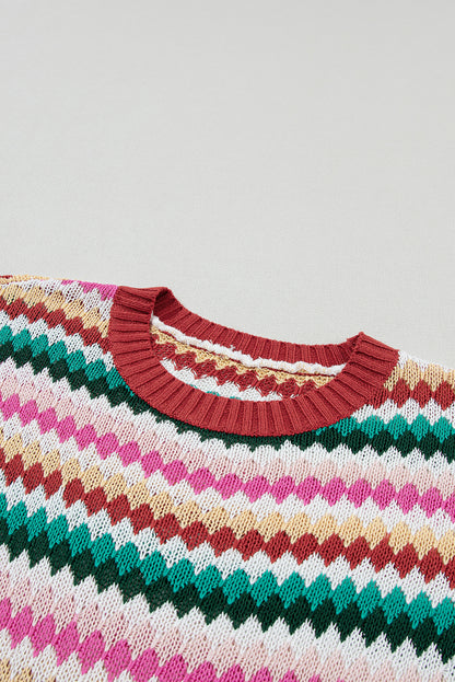 Colorful textured sweater with fiery red ruffle sleeves