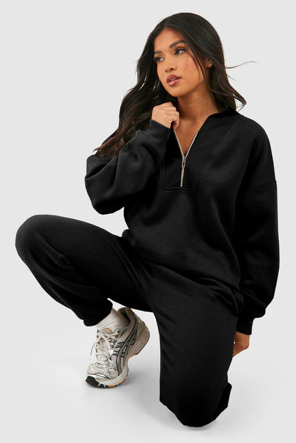 Chic black half zip tracksuit with ribbed edges for ultimate comfort