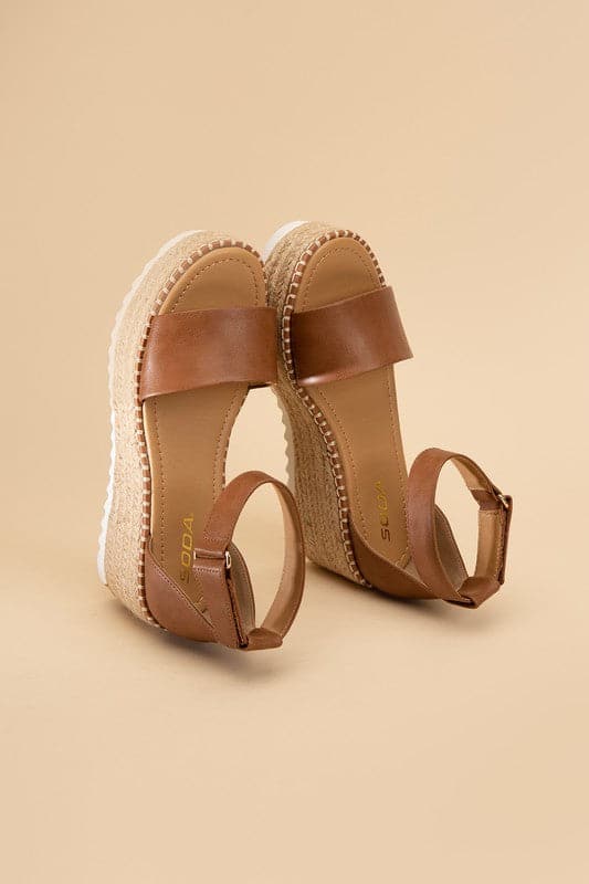 TUCKIN-S Platform Sandals.