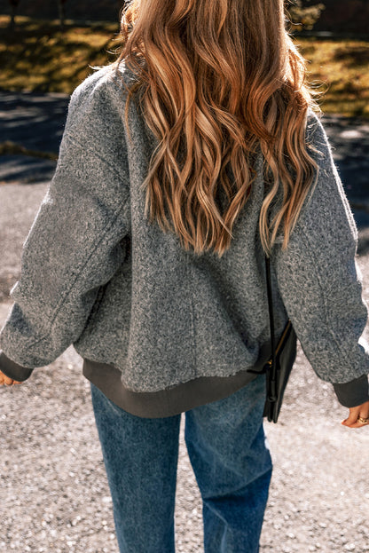 Chic medium grey fuzzy zip-up jacket with pocketed sleeves