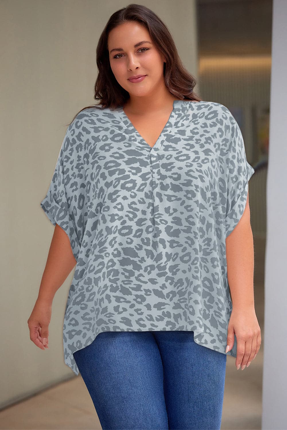 Plus Size Printed Notched Neck Half Sleeve Top.