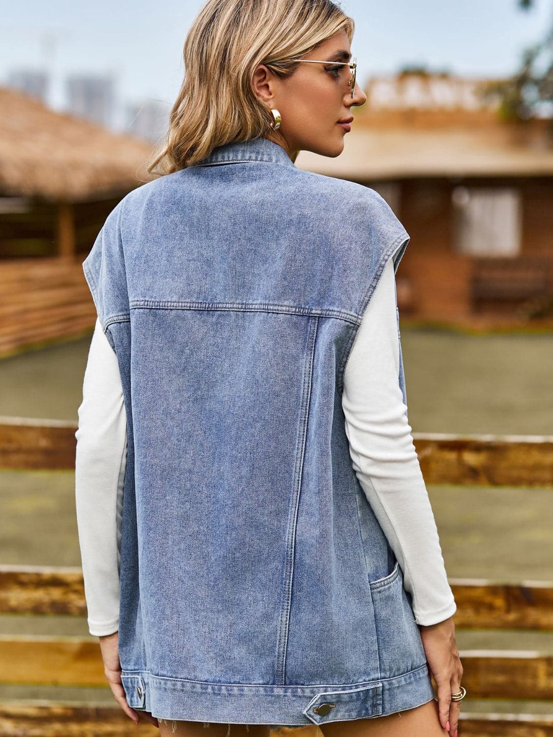 Button Up Collared Neck Sleeveless Denim Jacket.