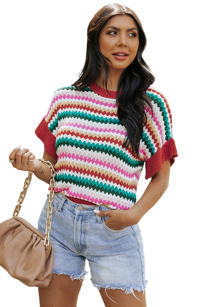 Colorful textured sweater with fiery red ruffle sleeves