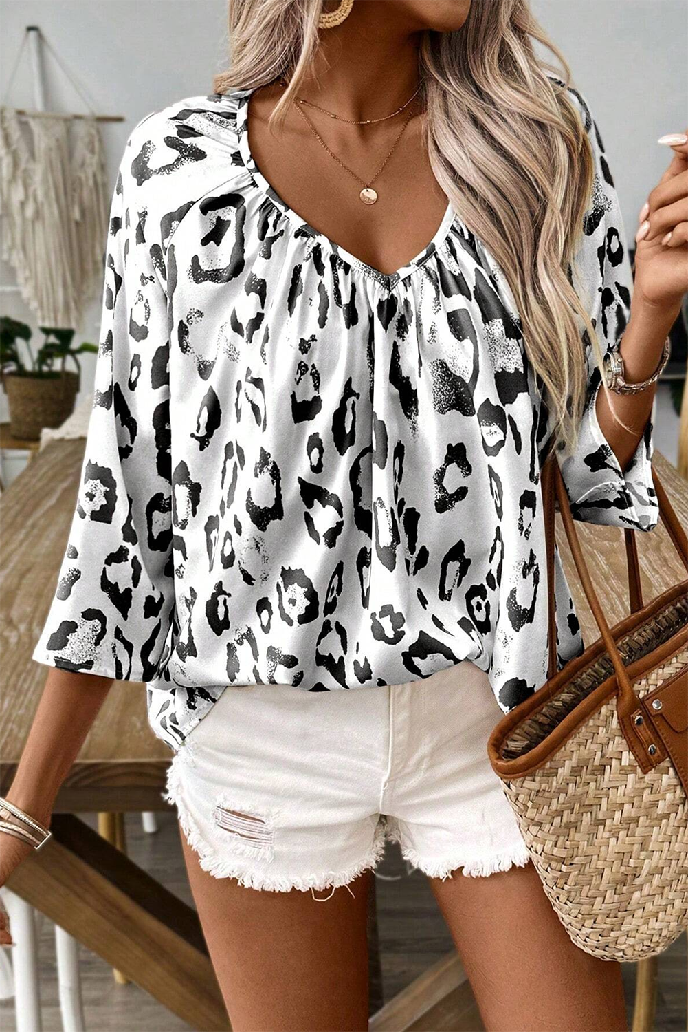 Fierce and Flirty Black Leopard Print Blouse with Ruched V-Neck