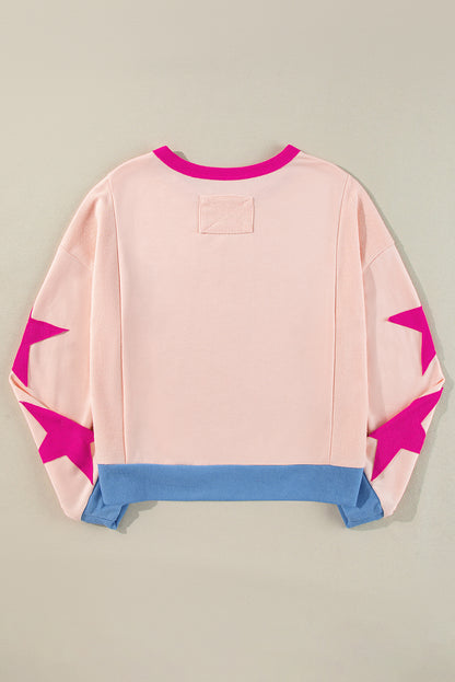 Chic light pink oversized sweatshirt with star patchwork design