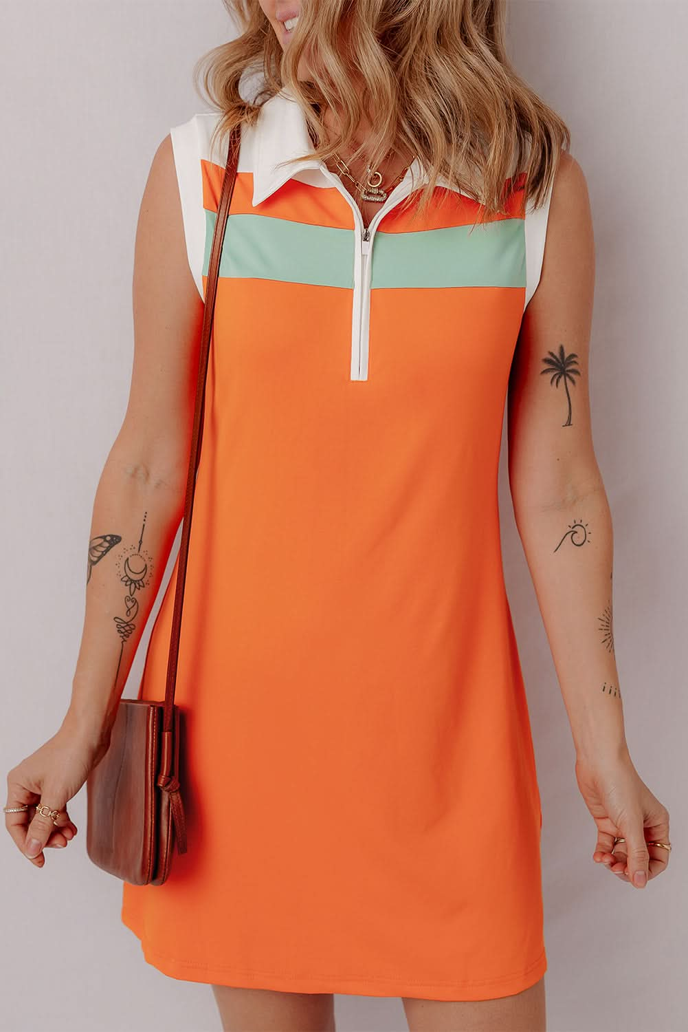 Russet Orange Color-blocked Athletic Mini Dress with Sleeveless Design and Quarter Zip Neckline