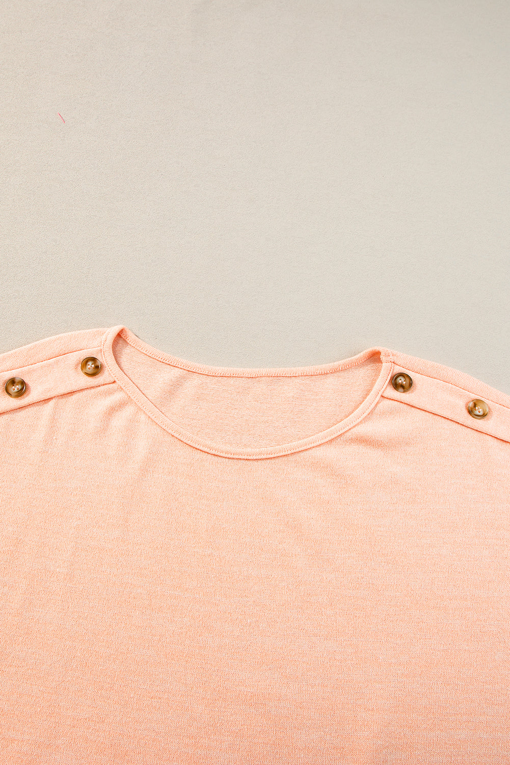 Chic apricot pink batwing sleeve tee with button accents