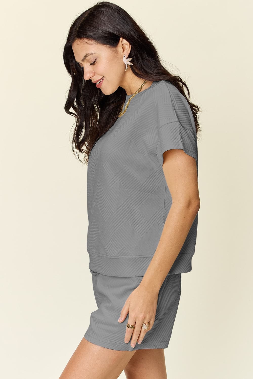 Double Take Full Size Texture Short Sleeve T-Shirt and Drawstring ShorFeatures: Drawstring
Number of pieces: Two-piece
Stretch: Slightly stretchy
Material composition: 97% polyester, 3% spandex
Care instructions: Machine wash cold. TumLove Salve Full Size Texture Short SleeveTwo-Piece Sets