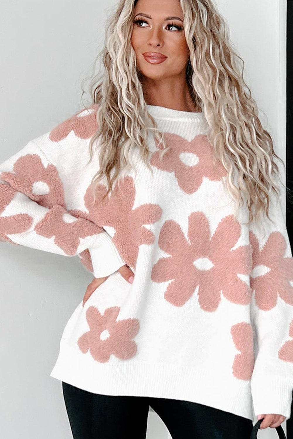 Floral-inspired white drop shoulder sweater for relaxed winter vibes