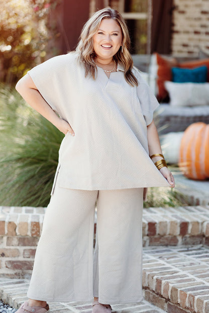 Chic beige plus size textured top and pants ensemble