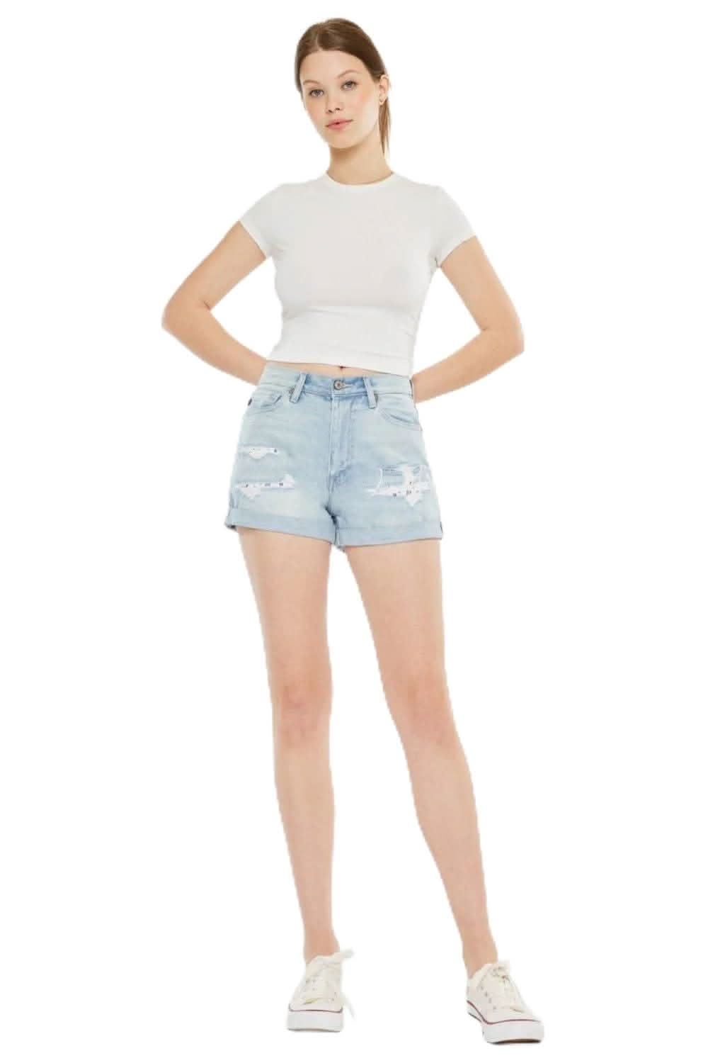 Vintage-inspired high rise repaired mom denim shorts