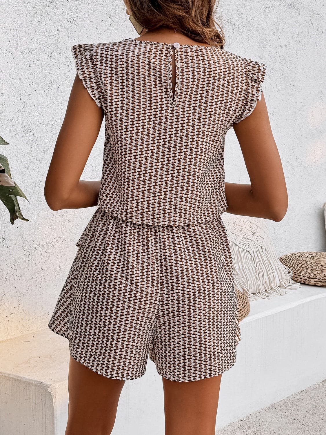 Printed Round Neck Top and Layered Shorts Set.