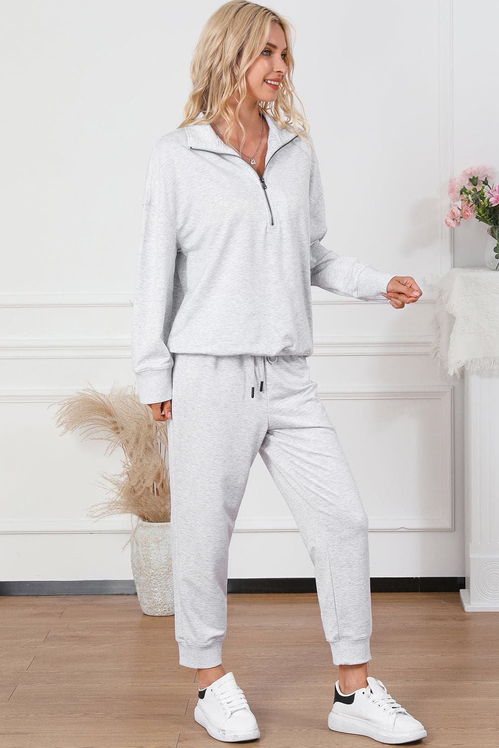 Half Zip Sweatshirt and Drawstring Sweatpants Set.