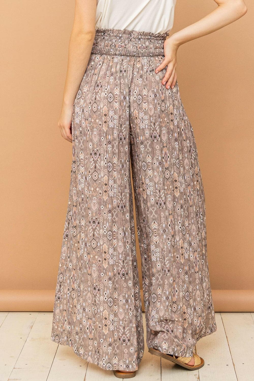 And The Why Printed Smocked Waist Slit Wide Leg PantsUpgrade Your Wardrobe with Style and Comfort
 The And The Why Printed Smocked Waist Slit Wide Leg Pants are a must-have addition to your fashion collection. These paLove Salve Printed Smocked Waist Slit Wide Leg Pantsusa