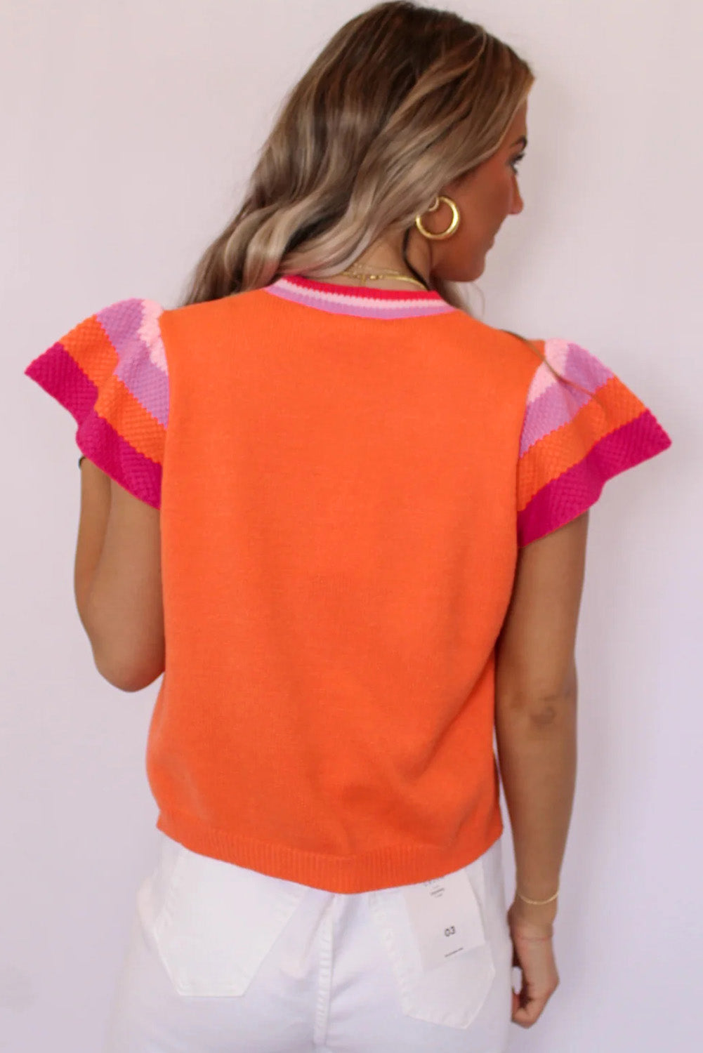 Carrot color block knitted sweater with flutter sleeves