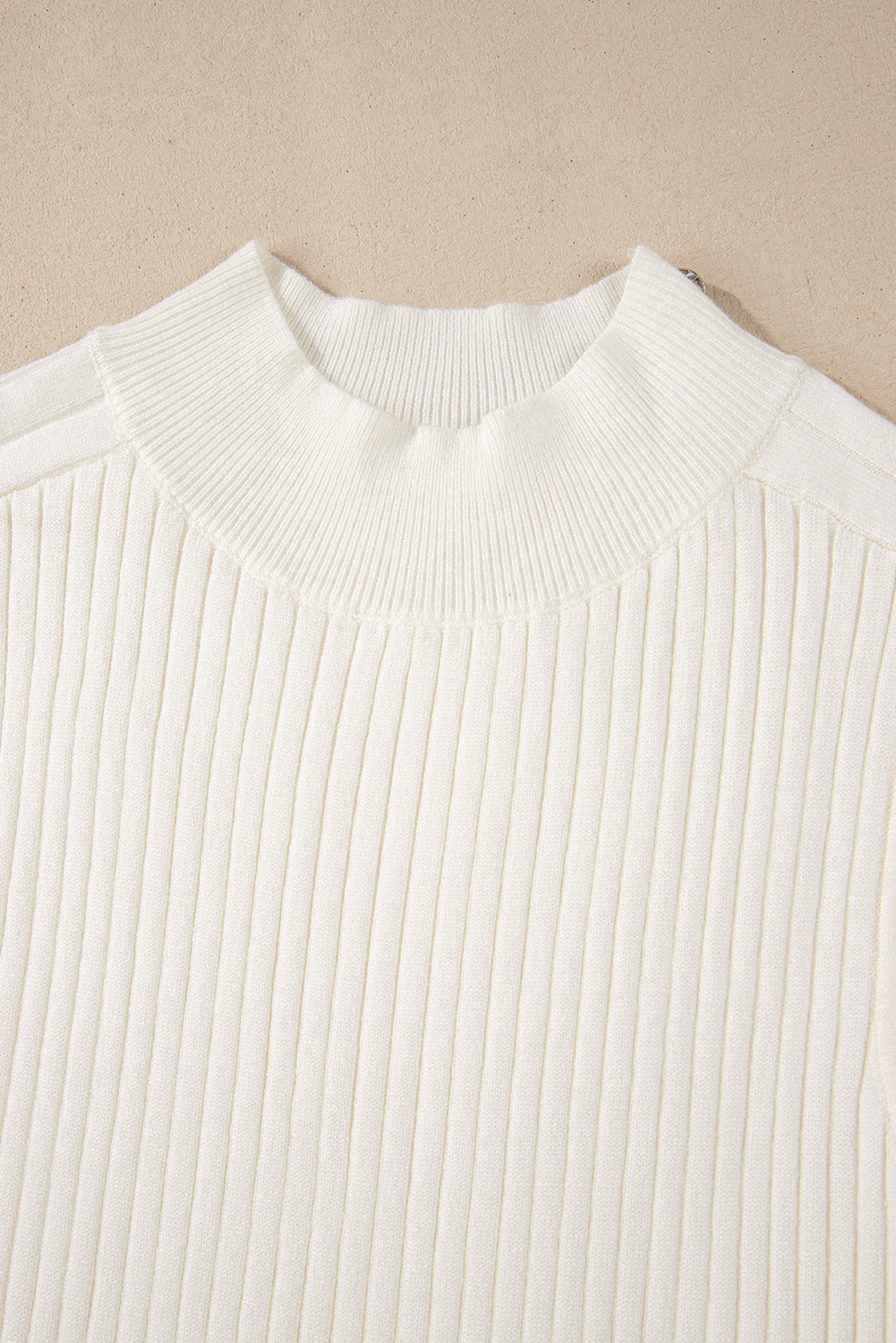 Chic white ribbed knit sleeveless high neck sweater vest