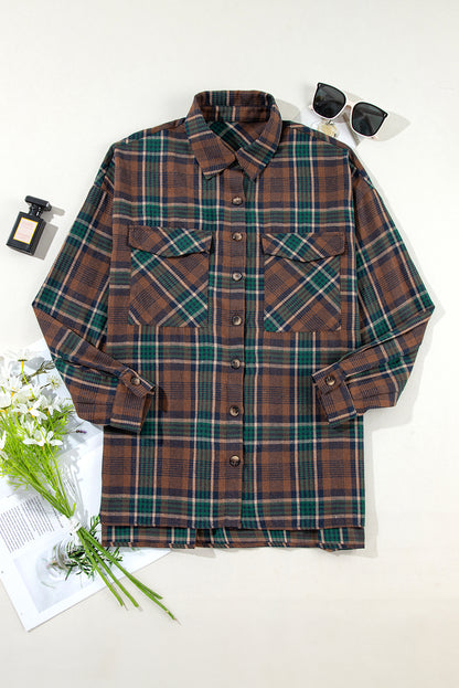 Brown plaid button-up shacket with chest pockets