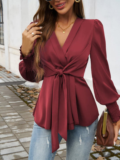 Smocked Surplice Long Sleeve Blouse.