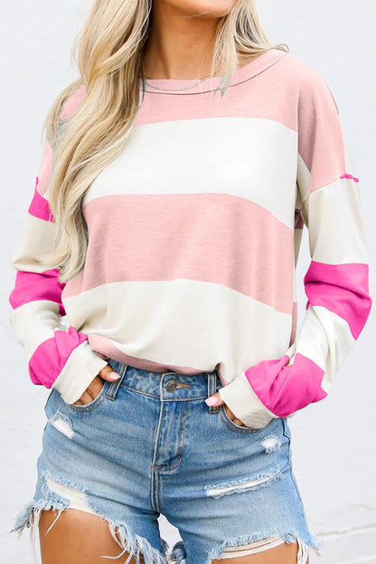 Chic light pink colorblock long sleeve top with drop shoulders