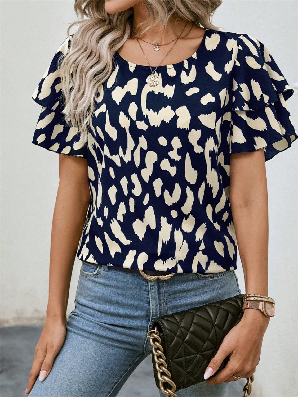 Ruffled Printed Round Neck Short Sleeve Blouse.