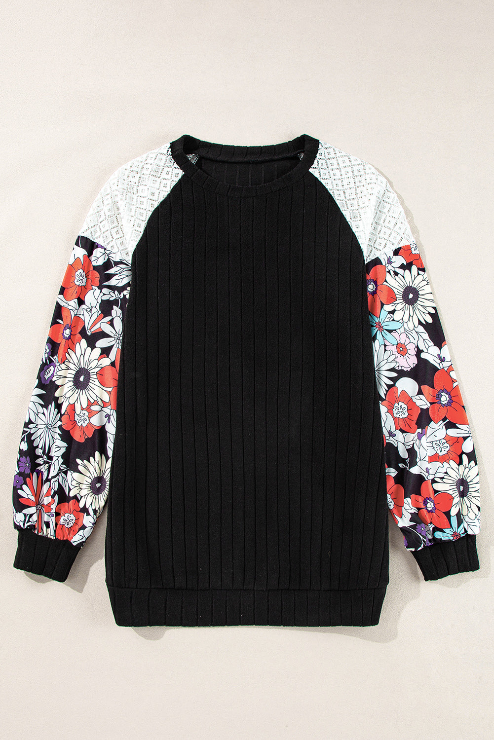 Elegant black floral patchwork ribbed blouse with long sleeves