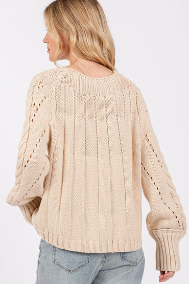 Cozy cable-knit oversized sweater with boat neckline