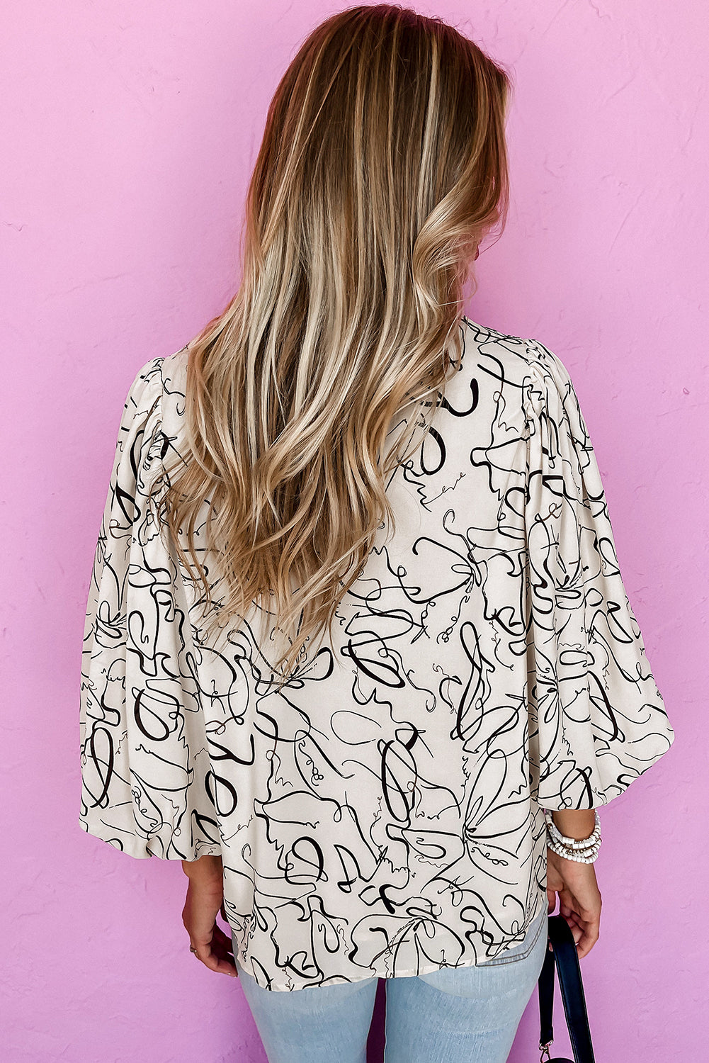 Chic beige abstract print blouse with balloon sleeves and crew neck