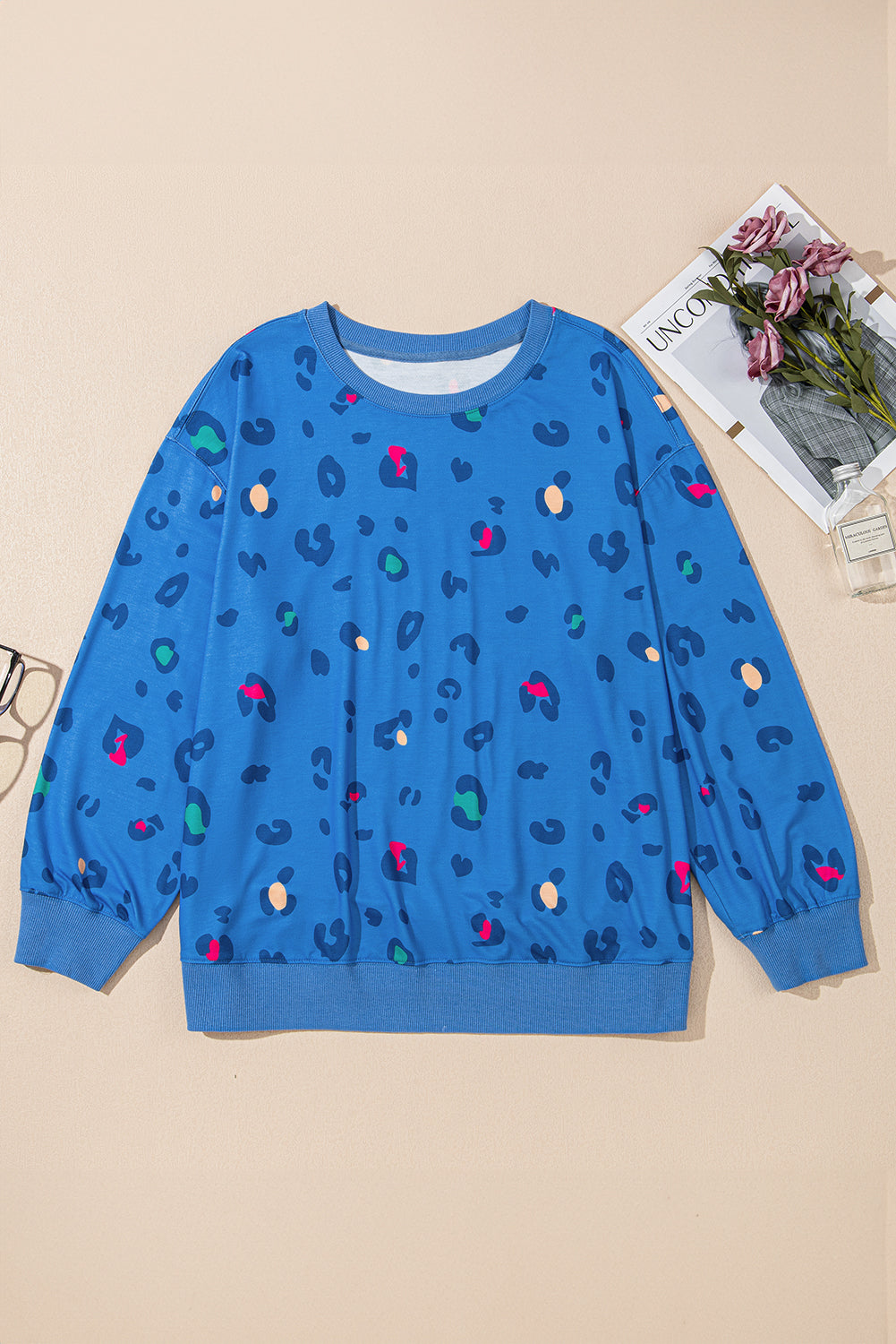 Sky blue leopard print drop shoulder pullover for effortless style