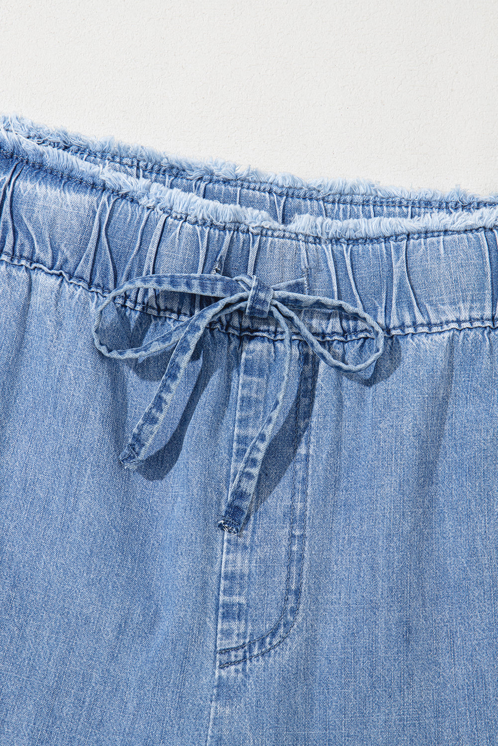 Plus Size Ruffled Ankle Jeans with Lace-Up Waist in Blue