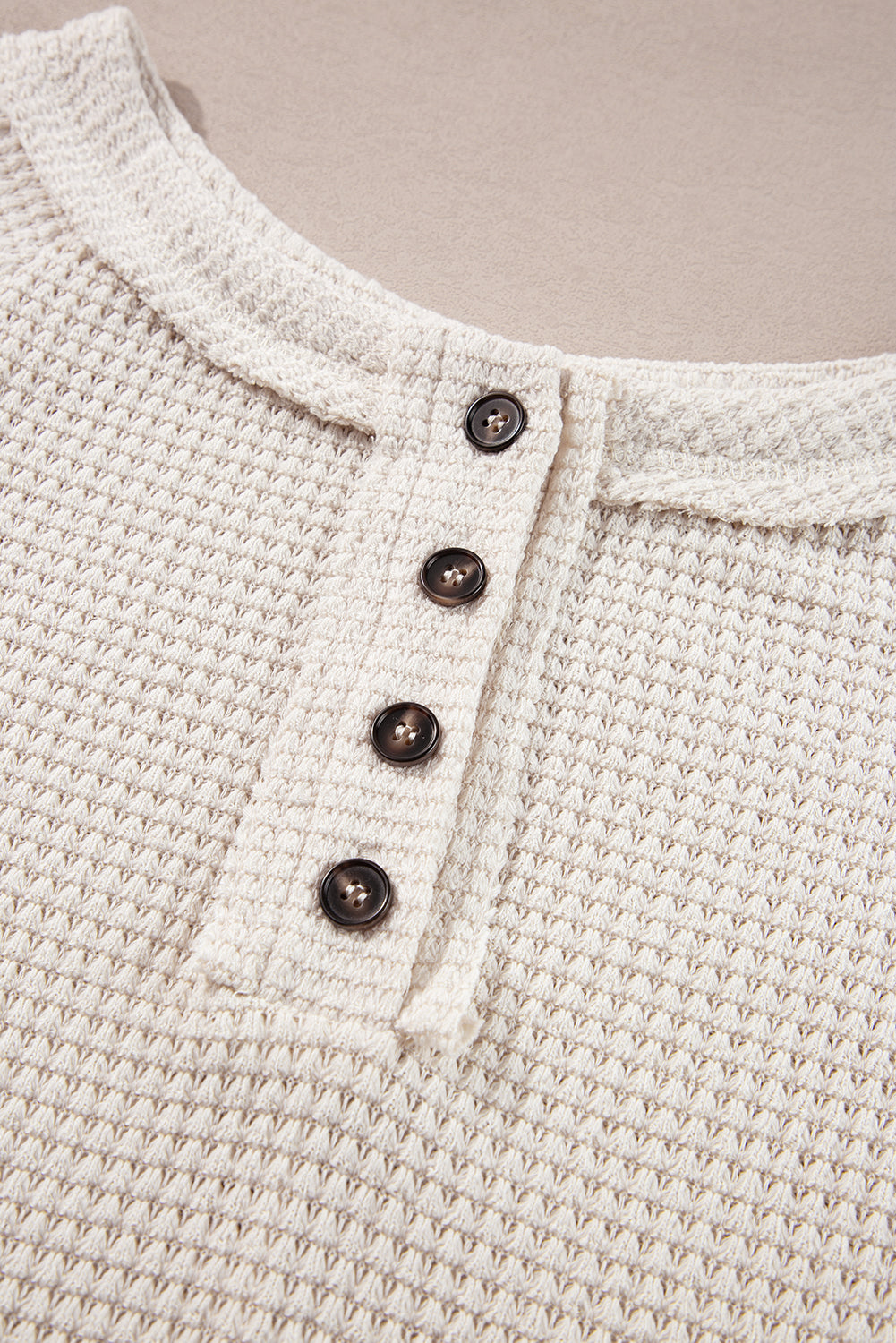 Cozy oatmeal waffle knit blouse with buttoned front and raglan sleeves