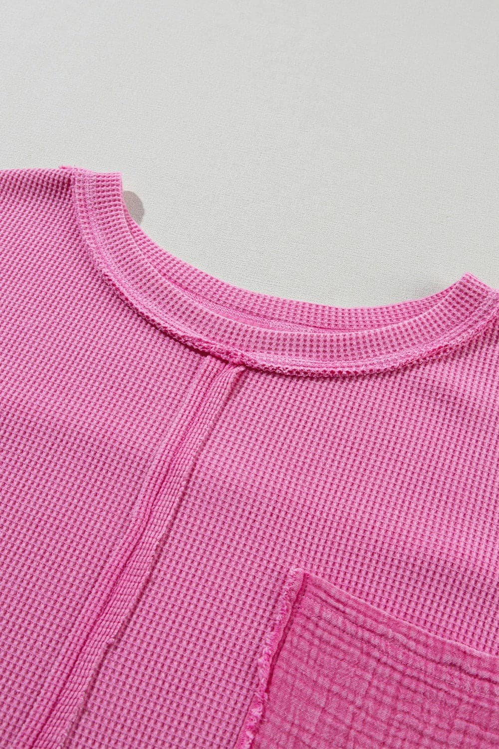 Pocketed Round Neck Three-Quarter Sleeve T-Shirt.