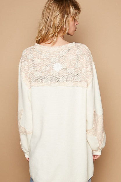 Chic round neck long sleeve top with crochet accents