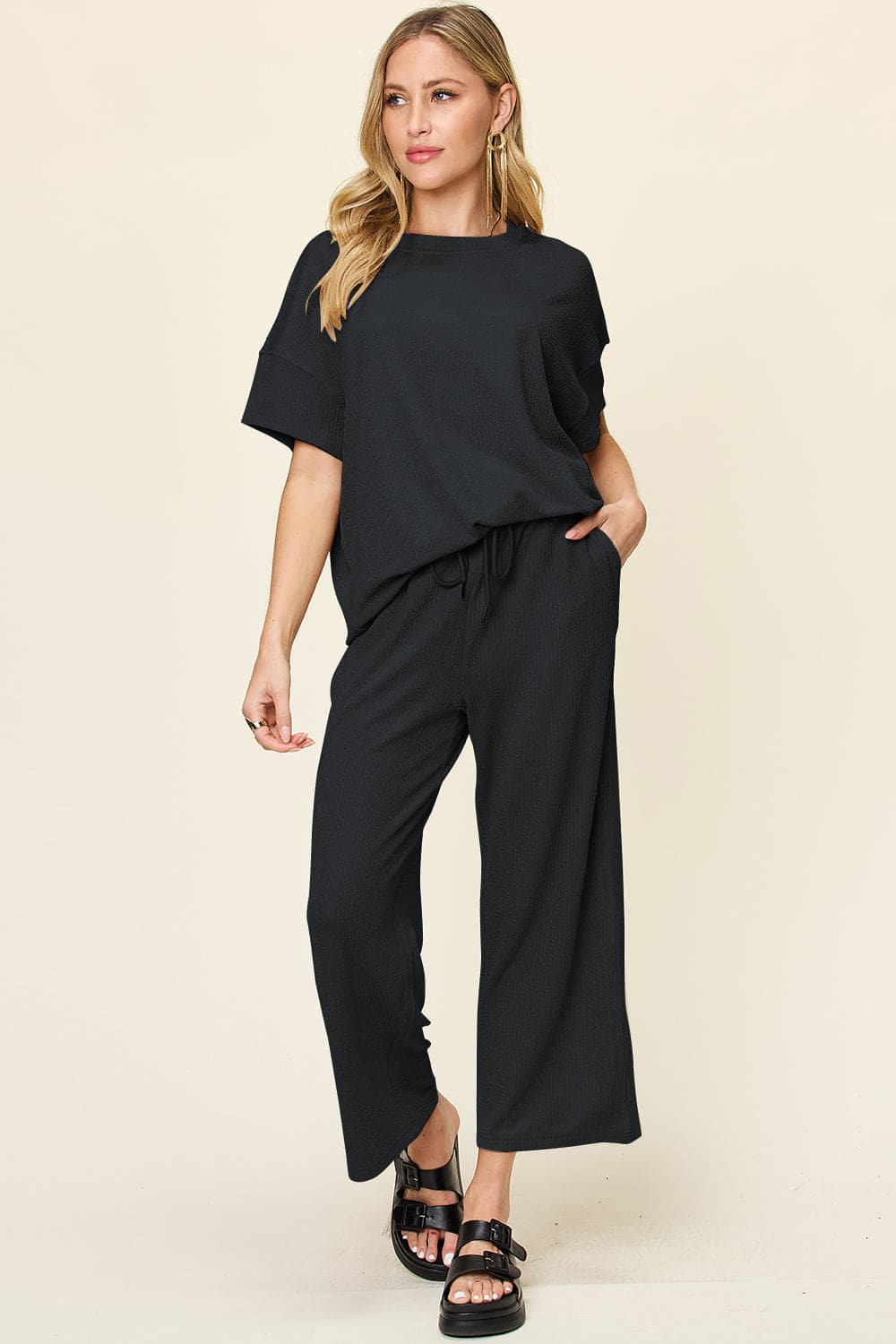 Double Take Full Size Texture Round Neck Short Sleeve T-Shirt and Wide Leg Pants.