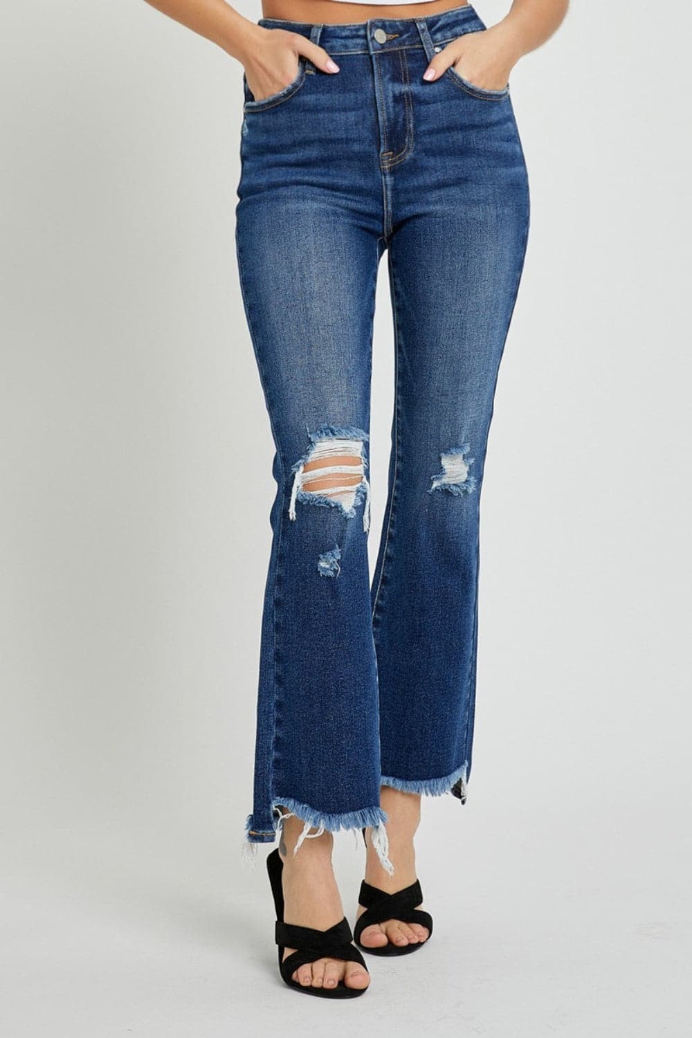 RISEN High Rise Distressed Crop Flare JeansThe High Rise Distressed Crop Flare Jeans are a trendy and edgy addition to your denim collection. Featuring a high rise fit, distressed detailing, and a cropped flaLove Salve RISEN High Rise Distressed Crop Flare JeansJeans