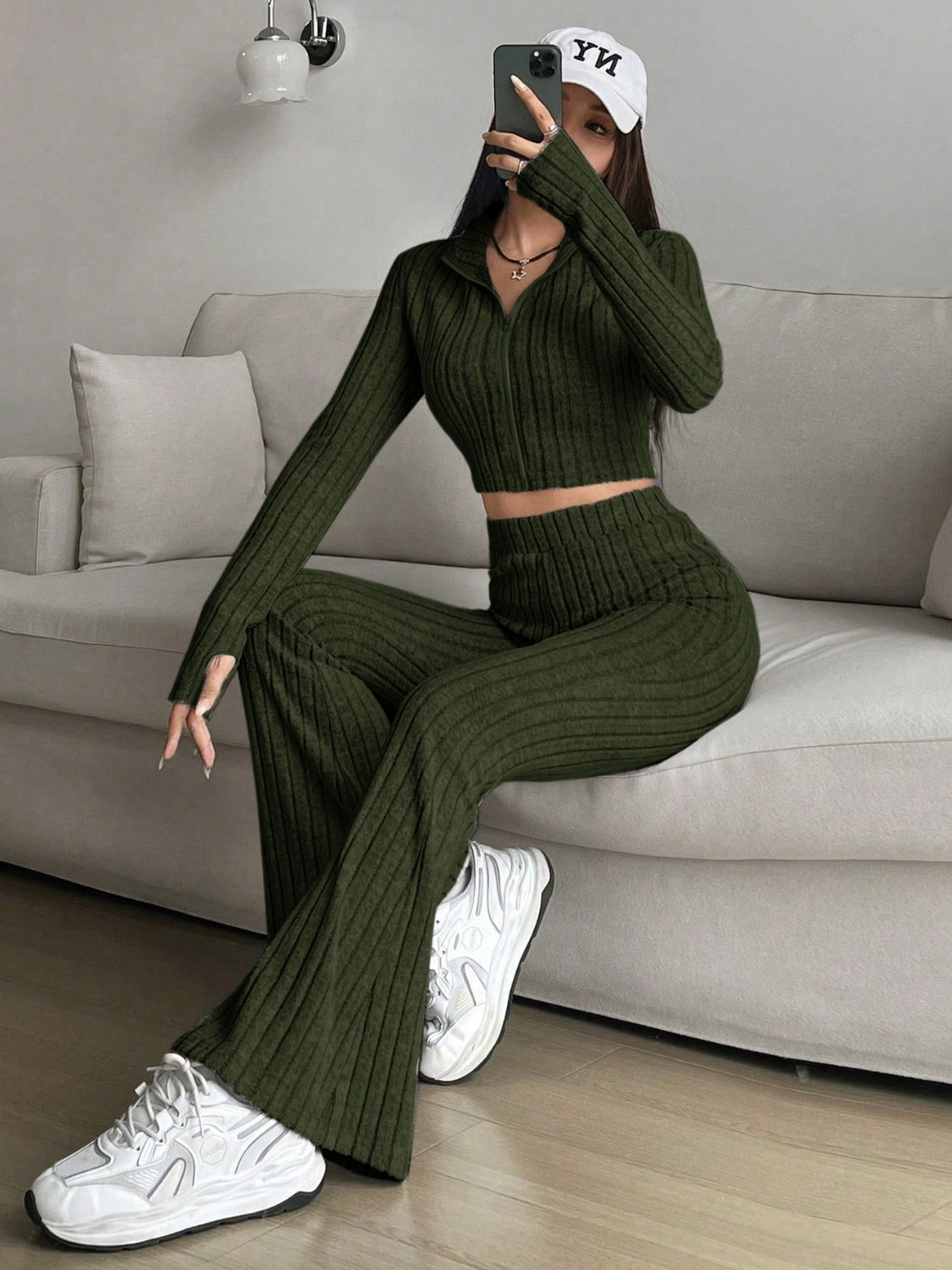 Zip Up Long Sleeve Top and Pants SetFeatures: Basic style
Number of pieces: Two-piece
Stretch: Slightly stretchy
Material composition: 95% polyester, 5% elastane
Care instructions: Machine wash cold. TLove Salve Long Sleeve TopTwo-Piece Sets