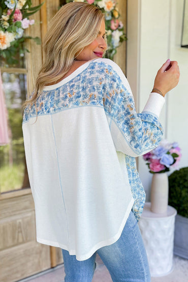 Chic white floral patchwork batwing blouse with V-neck design