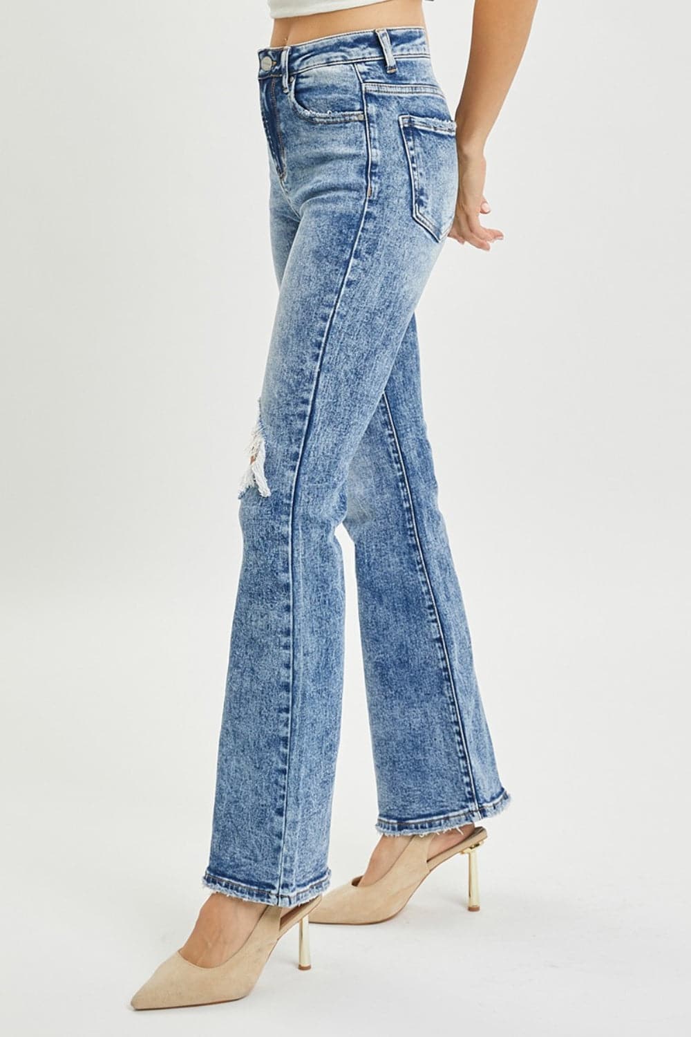 RISEN Full Size High Rise Distressed Flare Jeans.