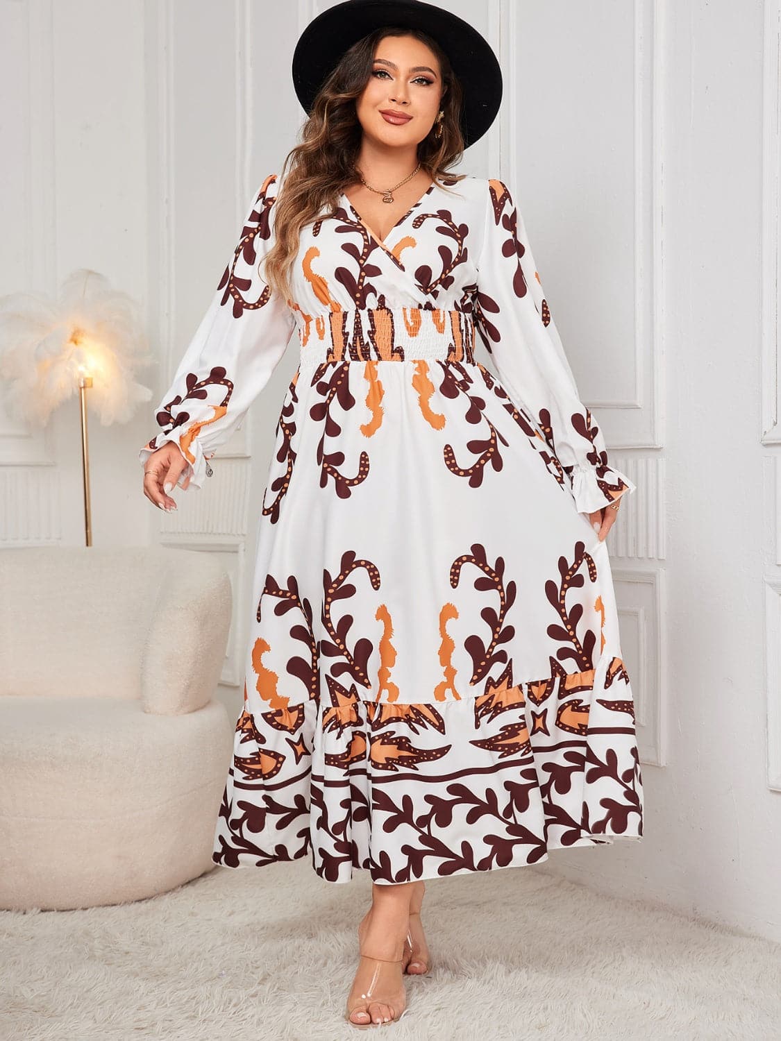 Plus Size Printed Surplice Flounce Sleeve Dress.