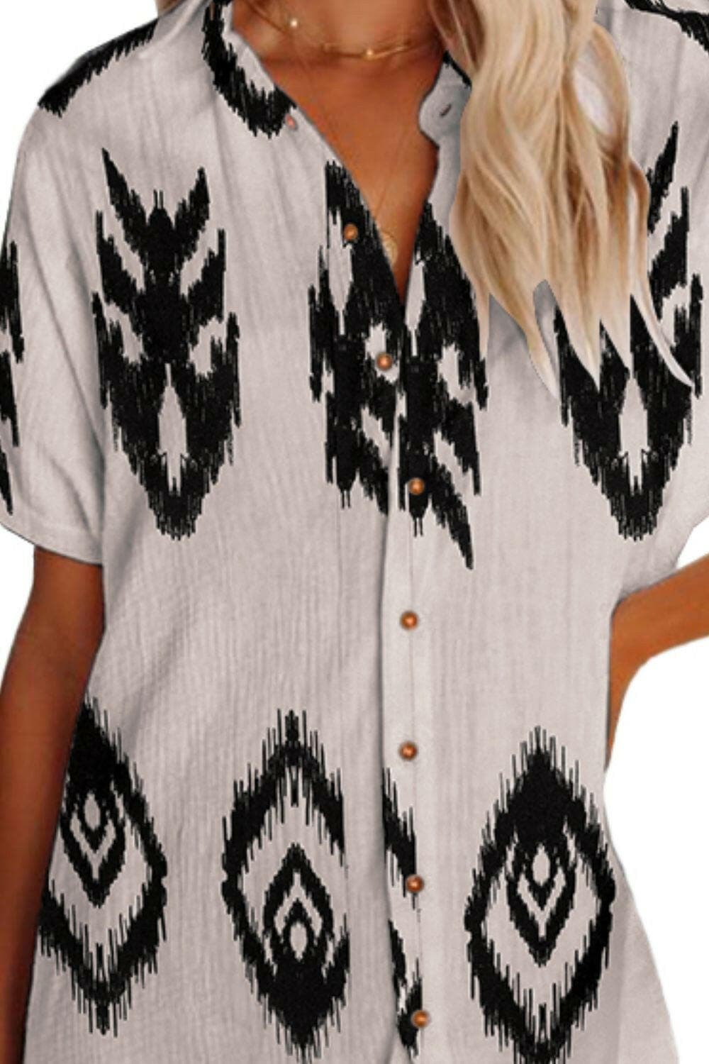 Geometric Button Up Short Sleeve Cover UpExperience Effortless Style with our Geometric Button Up Short Sleeve Cover Up
 
 
Chic Design: Elevate your look with the geometric pattern and sophisticated buttonLove Salve Short Sleeve Coverjust arrived