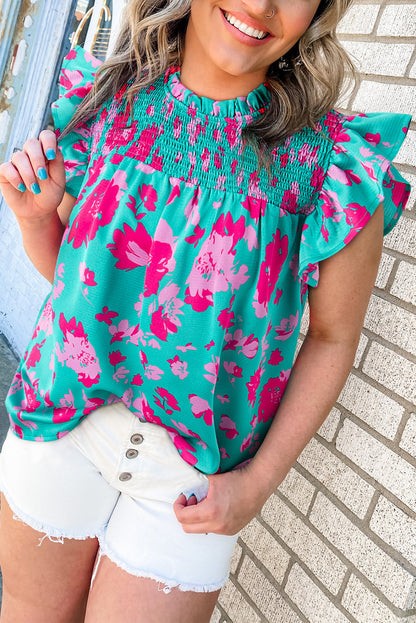 Floral green ruffled blouse with flutter sleeves