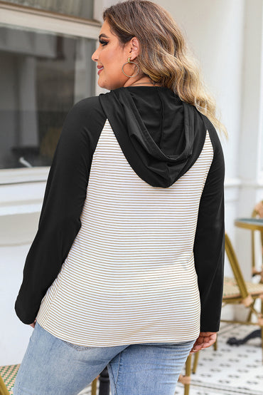 Plus size black and white striped hoodie with raglan sleeves and button pocket