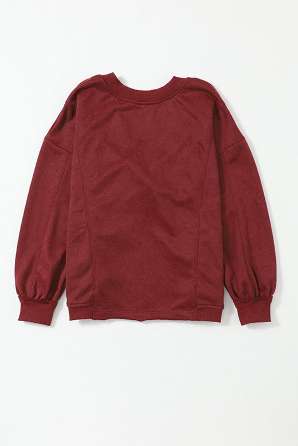 Twisted Round Neck Dropped Shoulder Sweatshirt.