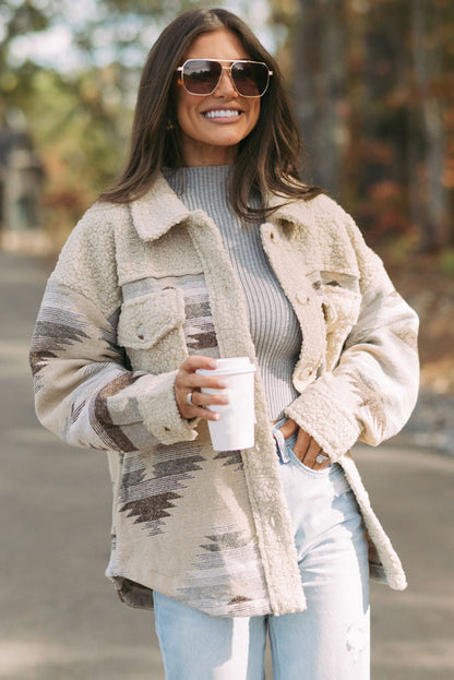 Khaki sherpa coat with vibrant Aztec print and flap pockets